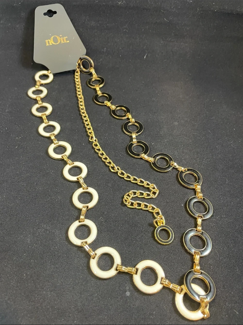 nOir Jewelry Gold Tone Reversible Belt with Black and Cream Enamel Rings